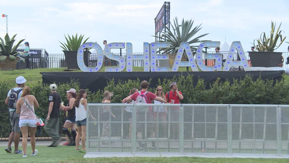 Fans gather for the 12th edition of the Osheaga Music Festival in Montreal, on Friday Aug. 4, 2017. 