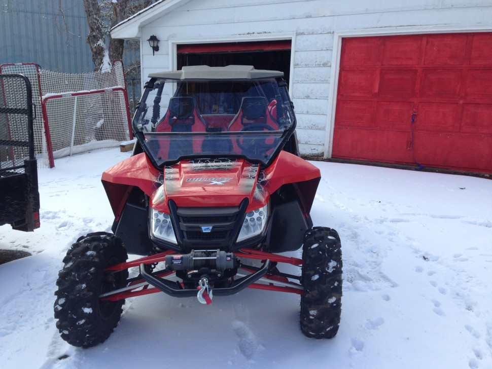 A red and black ATV that RCMP say was stolen between July 27 and Aug. 1, is pictured in this handout photo. 