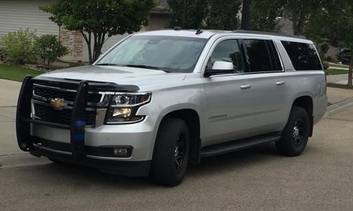 Police are searching for a grey 2015 Chevrolet Suburban with licence plate BWL 2384. The vehicle has black push bars on the front bumper, tinted windows and black rims.