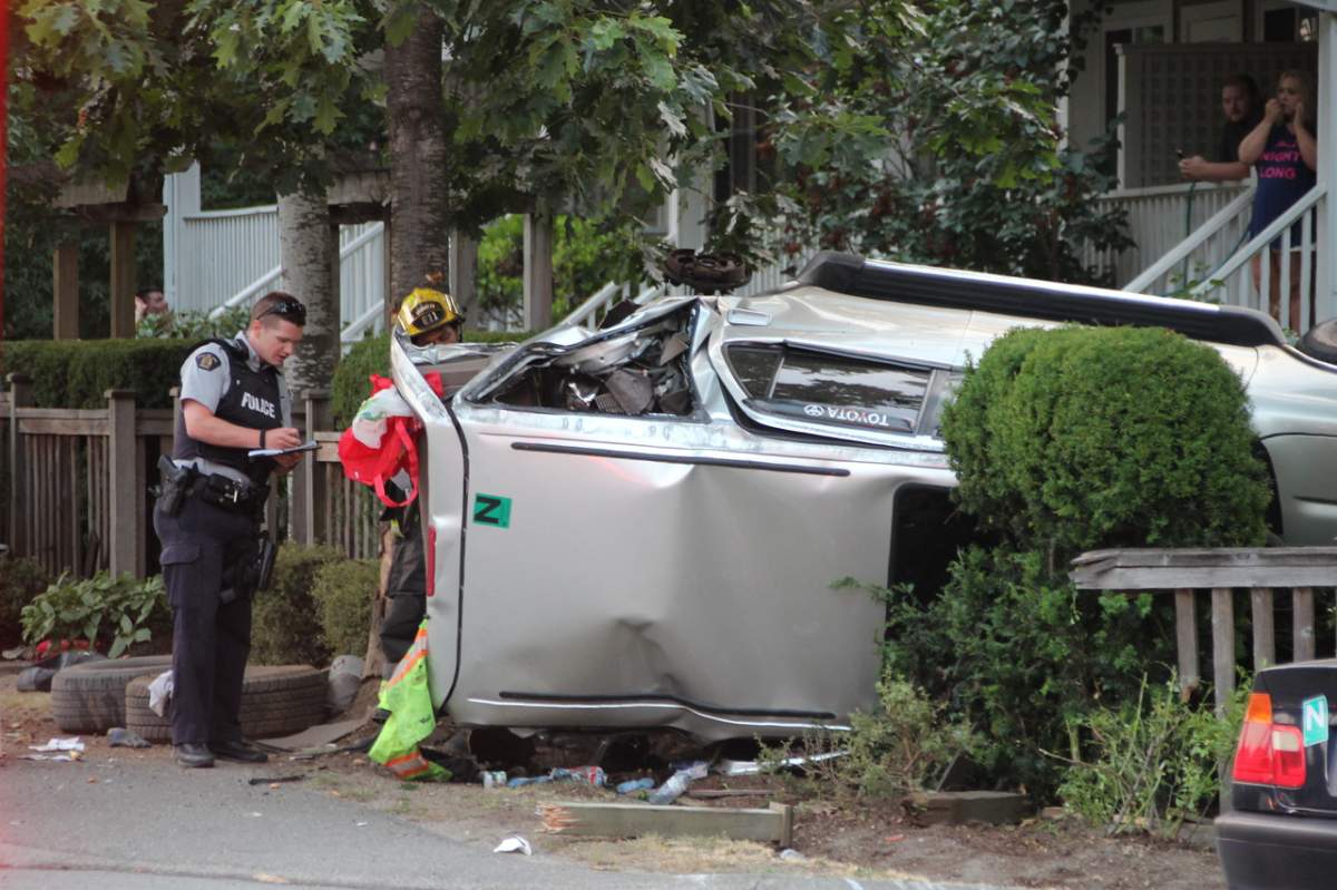The Toyota SUV ended up on its side near some homes.