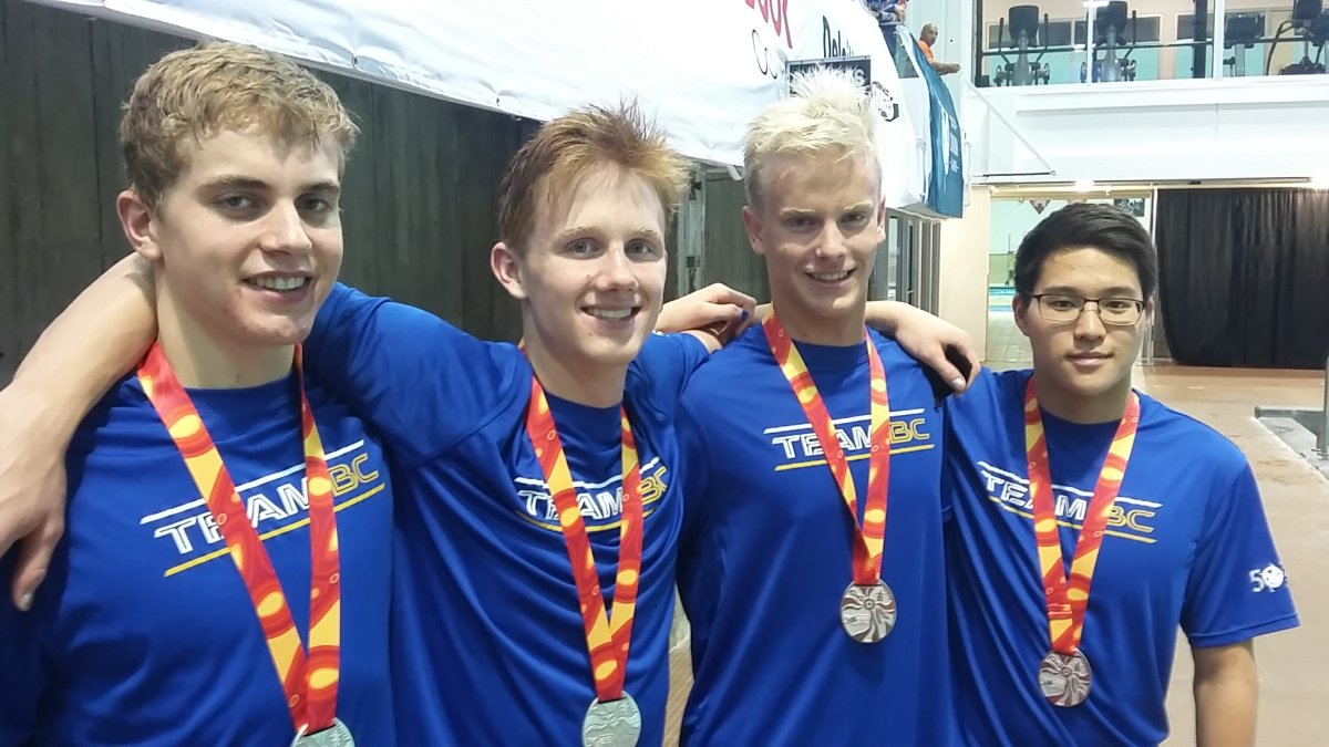 Tyler Wall  (second from left) with B.C.'s silver medal winning 4 x 100 freestyle relay team. 
