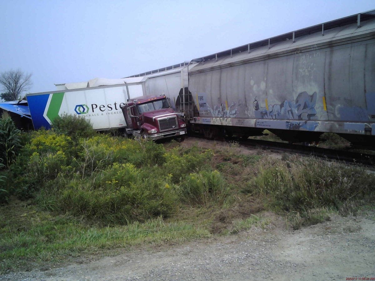 Train collides with transport truck and trailer just east of Mitchell on Monday, August 28, 2017.