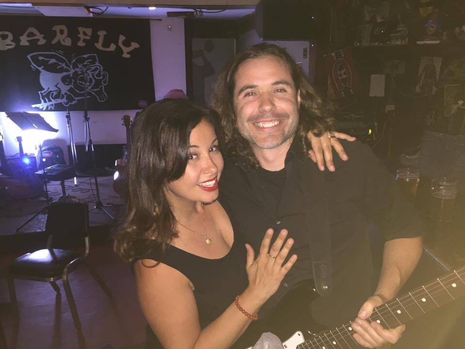 Adam Clarke and his wife, Sonia Beckhöfer-Fialho. The couple hopes to turn part of a fallen tree from the intense Montreal thunder storm into a guitar.