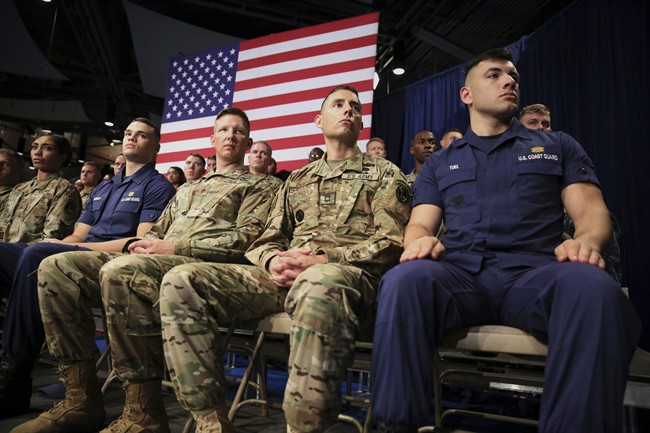 Members of the U.S. Military listen as President Donald Trump speaks at Fort Myer in Arlington Va., Monday, Aug. 21, 2017, during a Presidential Address to the Nation about a strategy he believes will best position the U.S. to eventually declare victory in Afghanistan. 