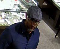 Hamilton police have released an image of a suspect wanted in the theft of a high-end watch at Lime Ridge Mall.
