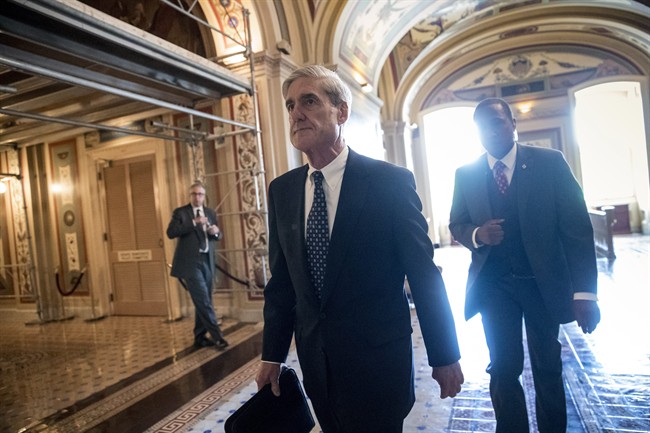 Special Counsel Robert Mueller departs after a closed-door meeting with members of the Senate Judiciary Committee about Russian meddling in the election at the Capitol in Washington.