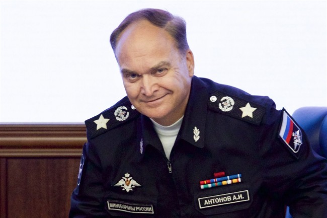  In this file photo taken on Friday, Oct. 7, 2016, Russian Deputy Defense Minister Anatoly Antonov smiles at a briefing in the Defense Ministry in Moscow, Russia. 