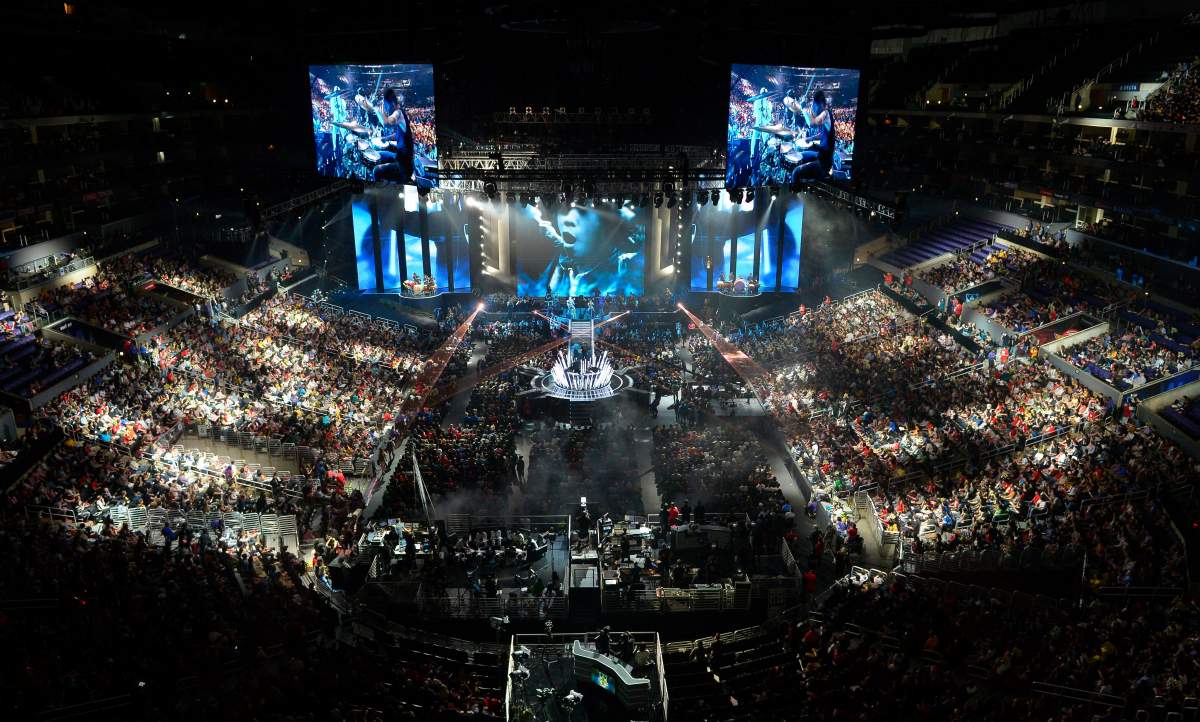 FILE – In this Oct. 4, 2013 file photo, fans watch the opening ceremony at the League of Legends Season 3 World Championship Final between South Korea’s SK Telecom T1 and China’s Royal Club, in Los Angeles.