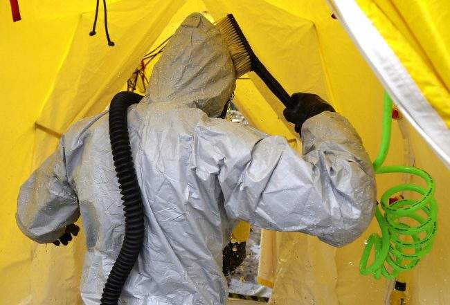 A member of the Washington Army National Guard 792nd Chemical Company from Grandview, Wash. takes part in an earthquake and tsunami drill, June 8, 2016.