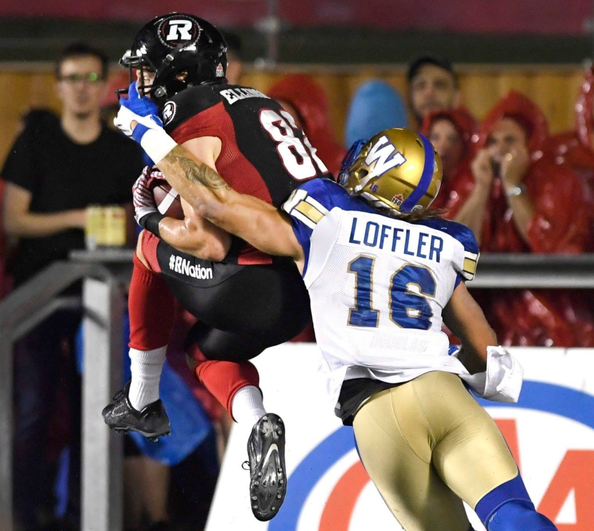 Ottawa Redblacks' Brad Sinopoli (88)catches the ball for a touchdown as Winnipeg Blue Bombers' Taylor Loffler (16) defends during second half of a CFL football game in Ottawa on Friday, Aug. 4, 2017. THE CANADIAN PRESS/Justin Tang.