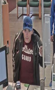 Calgary police are looking for a man wanted in connection with a bank robbery in northwest Calgary on Sept. 18, 2017.