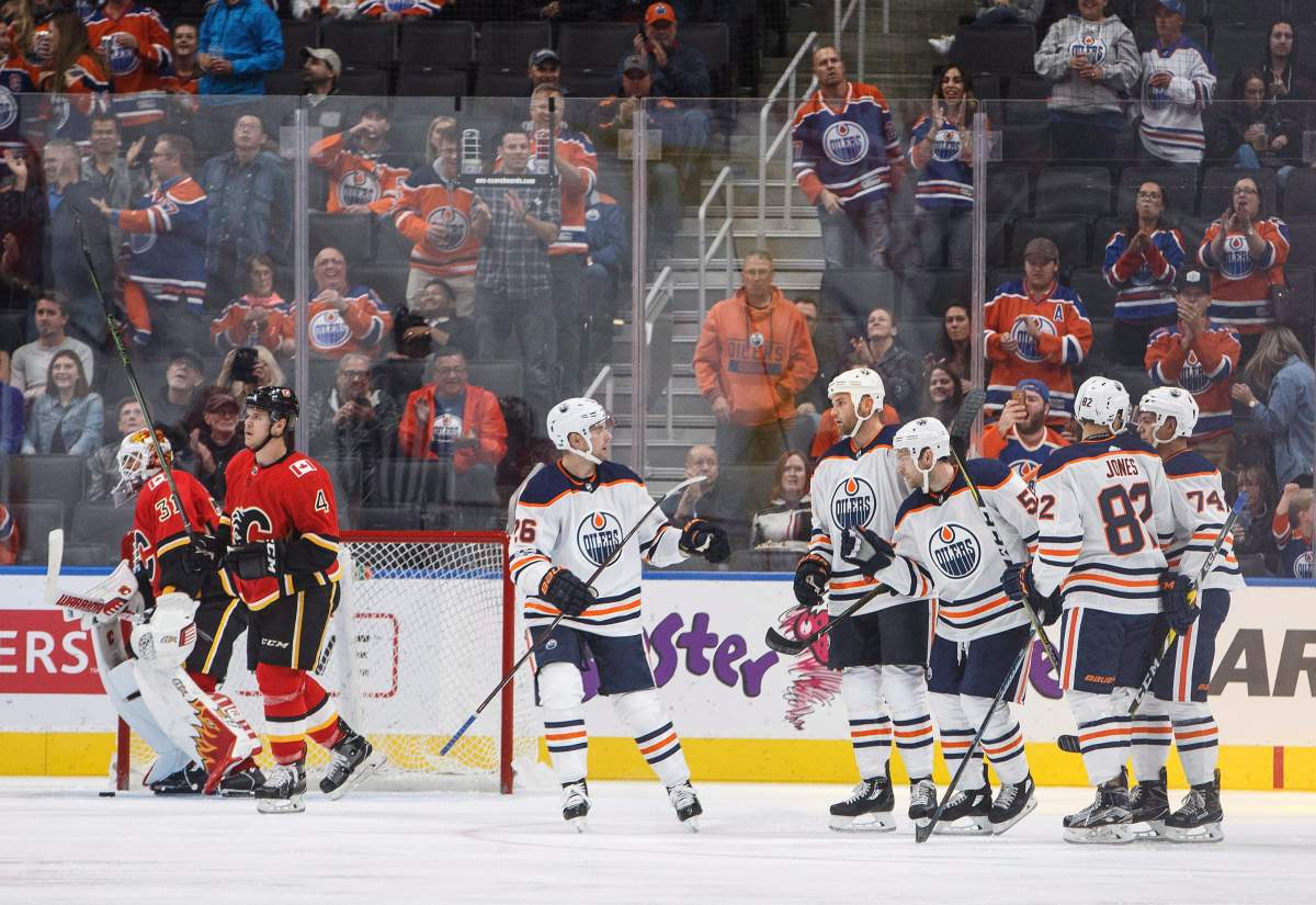 The Edmonton Oilers celebrate a goal against the Calgary Flames during first period NHL preseason split-squad hockey action in Edmonton, Alta., on Monday September 18, 2017.