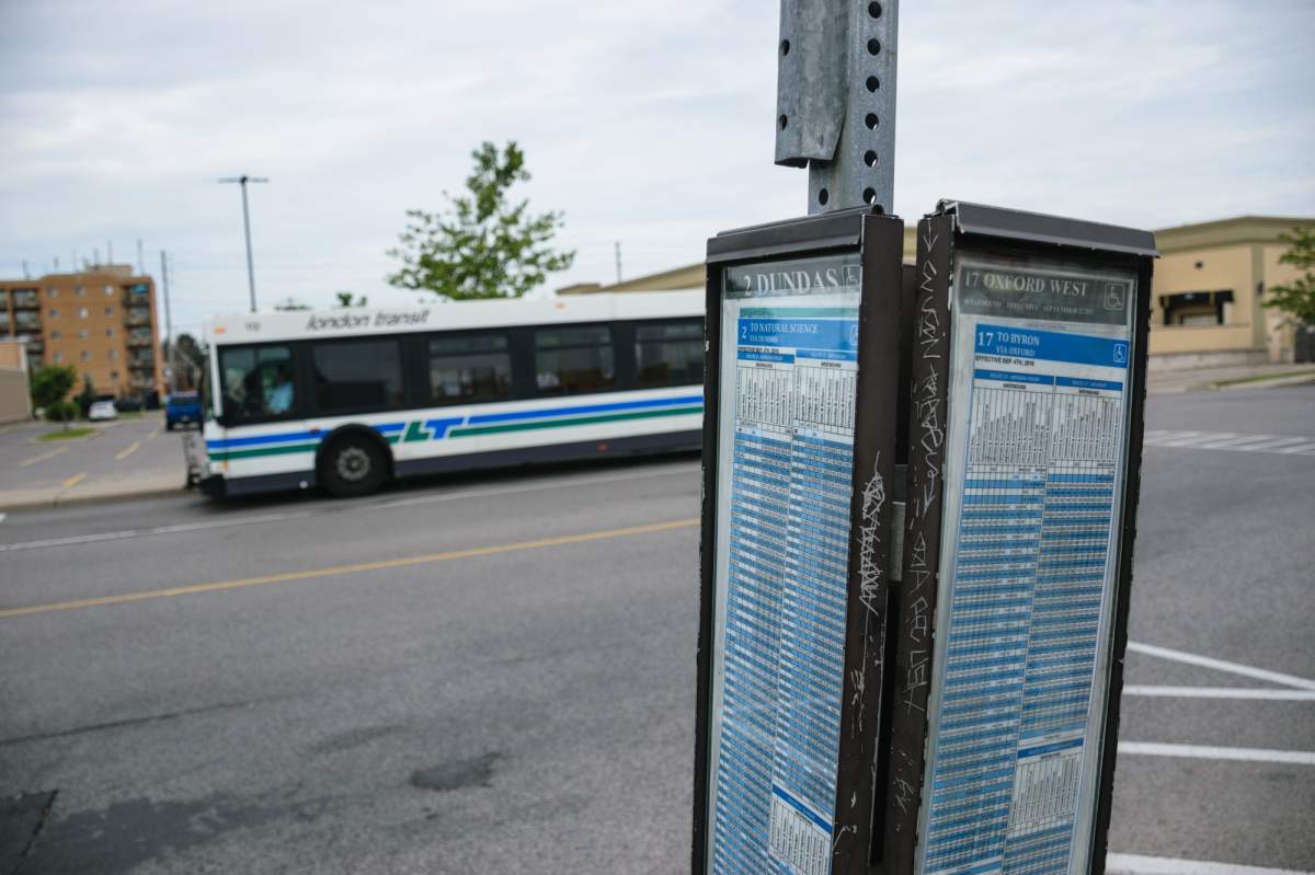 A London Transit schedule and bus at the Argyle Plaza bus terminal on July 19, 2017. (Matthew Trevithick/AM980).