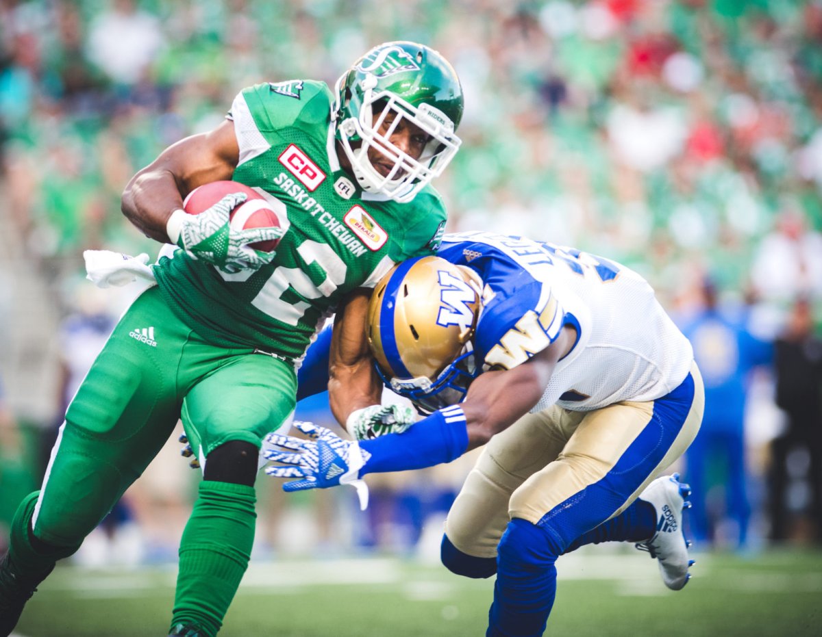 Cameron Marshall (32) of the Saskatchewan Roughriders and Maurice Leggett (31) of the Winnipeg Blue Bombers during the game at New Mosaic Stadium in Regina, SK, Saturday, July 1st, 2017.