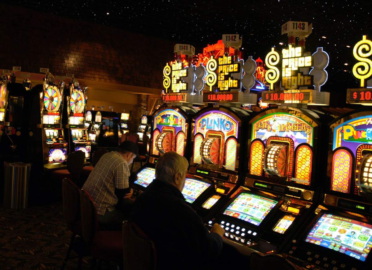 Gamblers playing slot machines at the River Rock Casino in Richmond B.C.