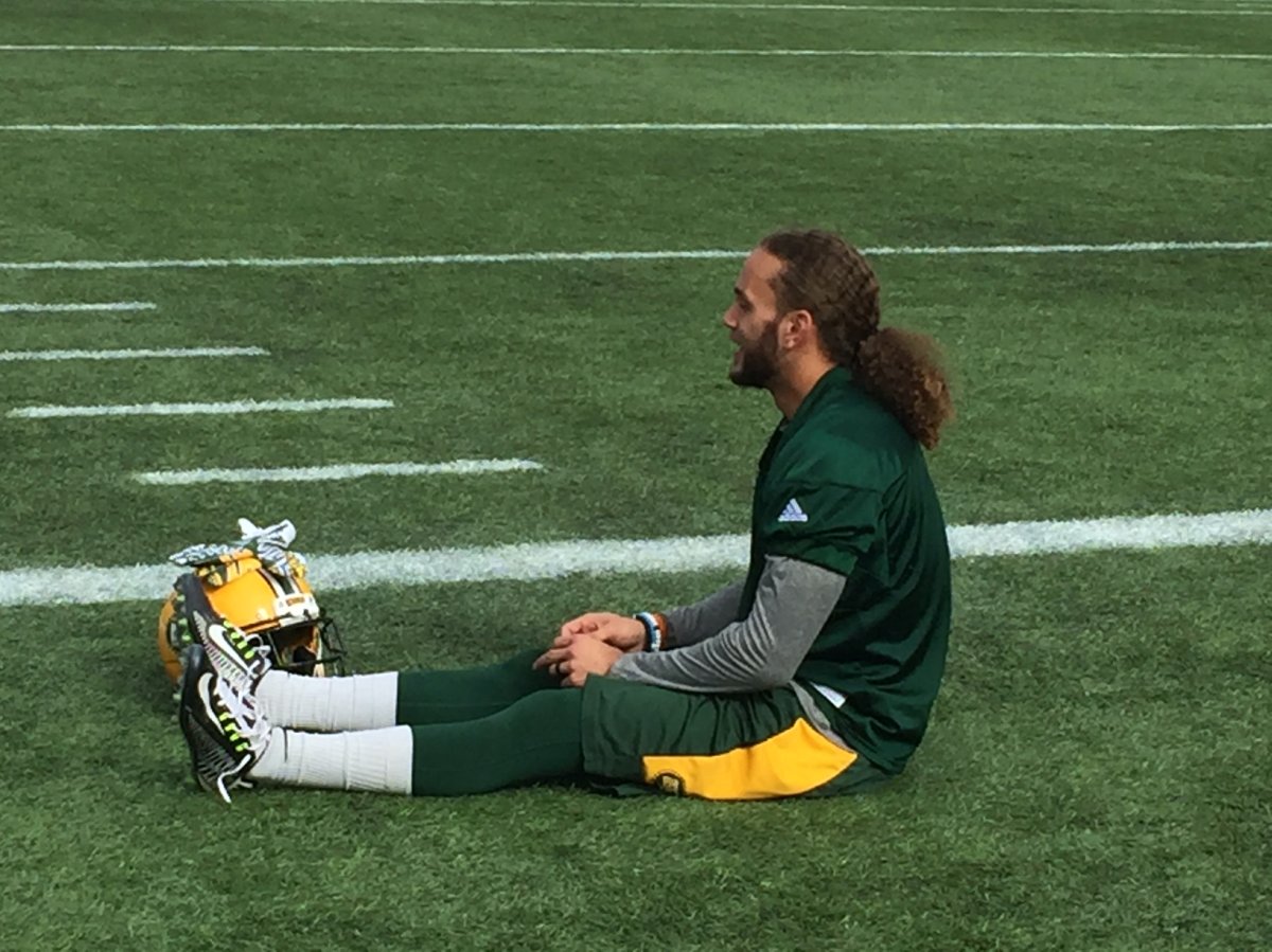 Eskimos defensive back Aaron Grymes takes a breather after his first practice since signing back with the team last week.