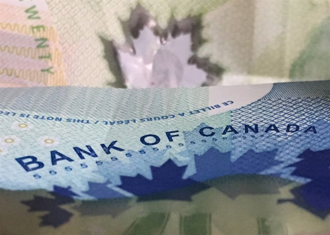 Canadian bank notes are seen Wednesday September 6, 2017 in Ottawa.