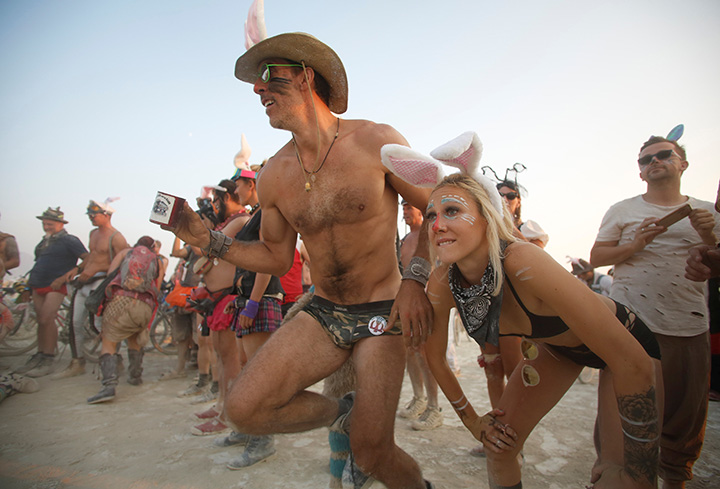 Members of the Bunny March try to race past members of the Carrot Team to reach “The Man” during the annual Burning Man arts and music festival in the Black Rock Desert of Nevada, August 31, 2017.