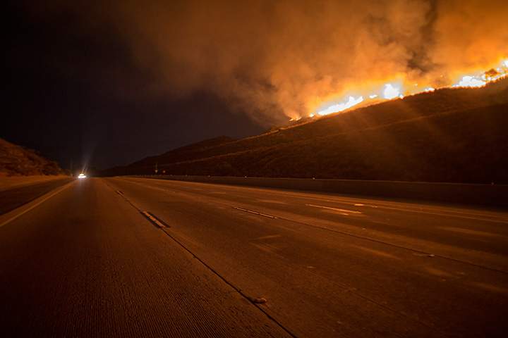 The 210 Freeway remains closed as flames continue to spread at the La Tuna Fire on September 2, 2017 near Burbank, California.