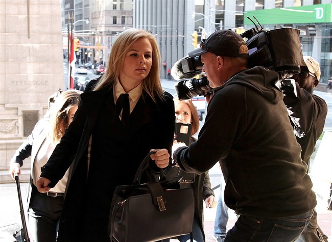 Laura Miller, deputy chief of staff to former Ontario premier Dalton McGuinty, arrives at court in Toronto on Monday, Sept. 11, 2017.