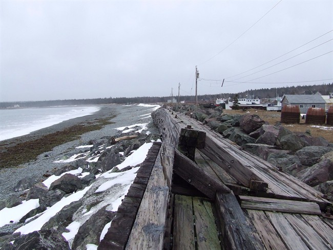 A seawall in Gabarus, N.S. is shown in this handout image. For decades, a seawall made of timber and rock protected the tiny 300-year-old fishing village in Cape Breton from the punishing waves of the Atlantic. 
