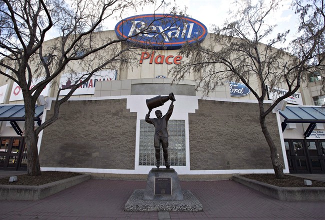 The Wayne Gretzky statue stands in front of Rexall Place home of the Edmonton Oilers in Edmonton, Alta., on Saturday April 2, 2016. 