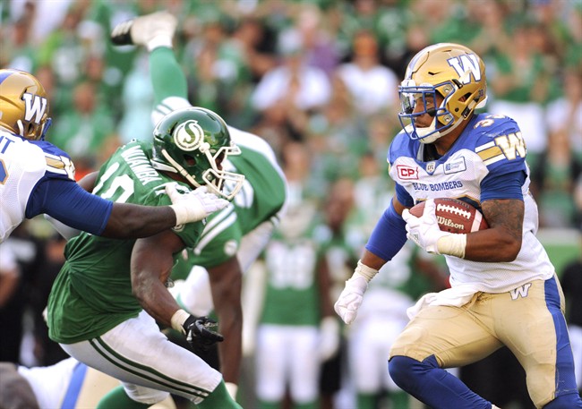 Winnipeg Blue Bombers running back Andrew Harris works his way upfield during second half CFL action against the Saskatchewan Roughriders, in Regina on Sunday, September 3, 2017. Andrew Harris sent some medical advice to one of his Saskatchewan rivals this week. The Blue Bombers running back revealed with a grin what he messaged to a Roughriders defender ahead of Saturday's sold-out Banjo Bowl rematch in Winnipeg.THE CANADIAN PRESS/Mark Taylor