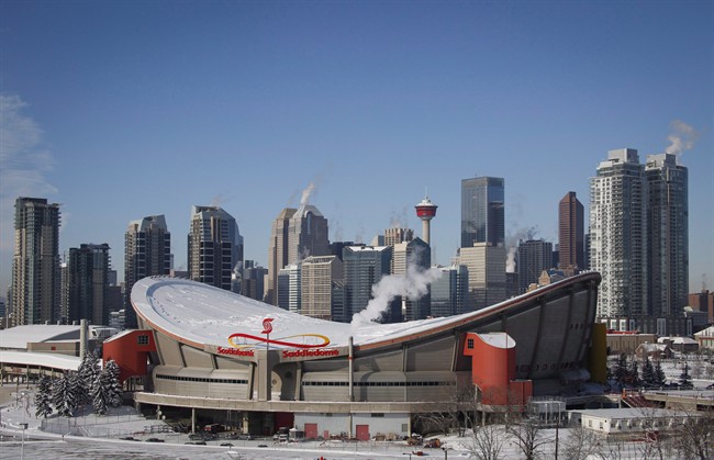 Steam rises from buildings near the Scotiabank Saddledome in Calgary.