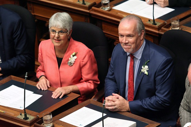 Finance Minister Carole James and Premier John Horgan.