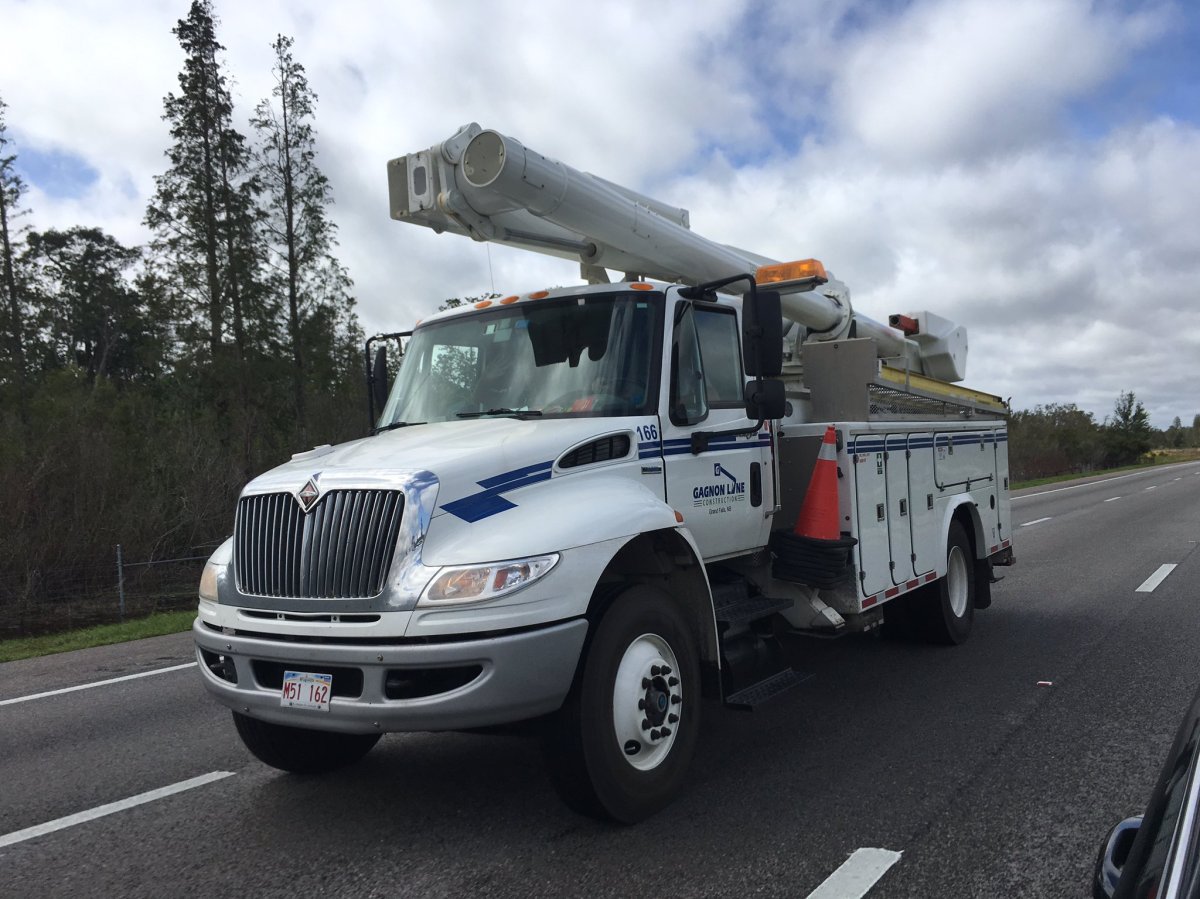 Trucks with Gagnon Line Construction were seen by Global News as they traveled towards Orlando on September 11, 2017.