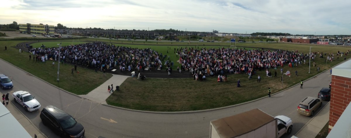 Thousands of Muslims gathered on the field at St. Andre Bessette Catholic Secondary School on Friday, Sept. 1, 2017.