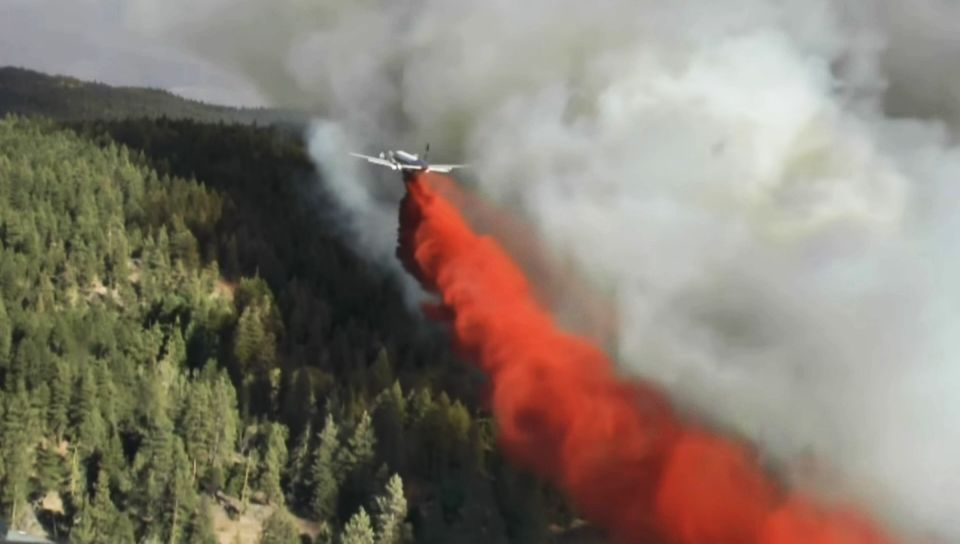 Dramatic footage of Finlay Creek fire fight from the air - image