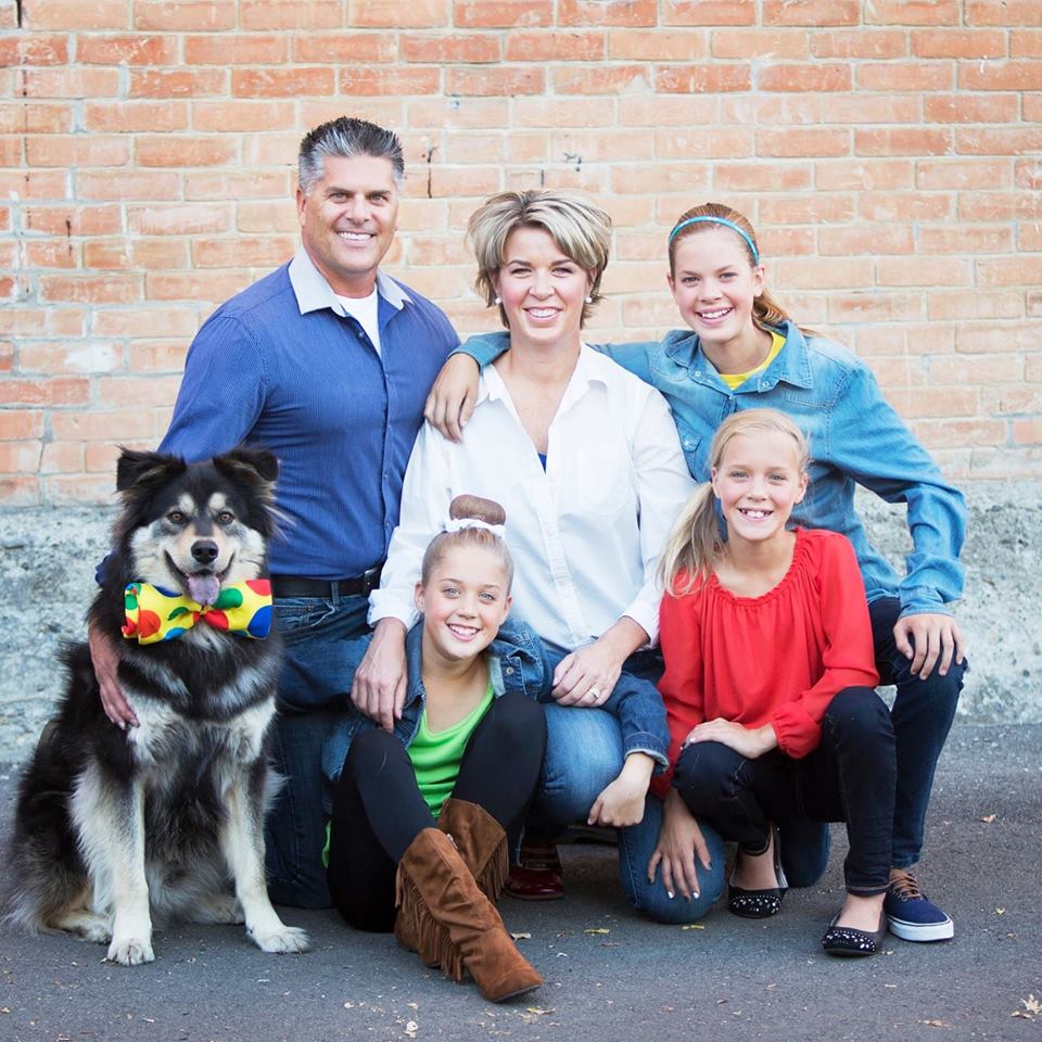 The Morris family's dog Fozzy (bottom left) went missing when it was inside their SUV that was stolen Sunday. 