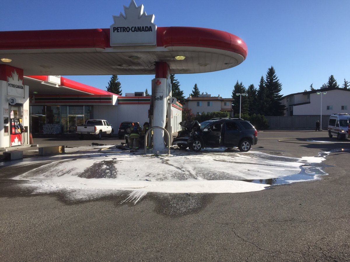 Emergency crews cleaning up after an SUV crashed into a gas pump Saturday. 
