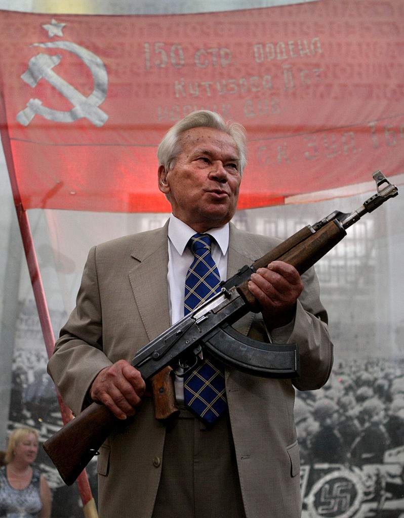 Famous Russian weapon designer Mikhail Kalashnikov, 87, poses with the first model of his legendary AK-47 assault rifle during a ceremony celebrating the 60th anniversary of his rifle in Moscow in July 2007. Photo credit: DIMA KOROTAYEV/AFP/Getty Images