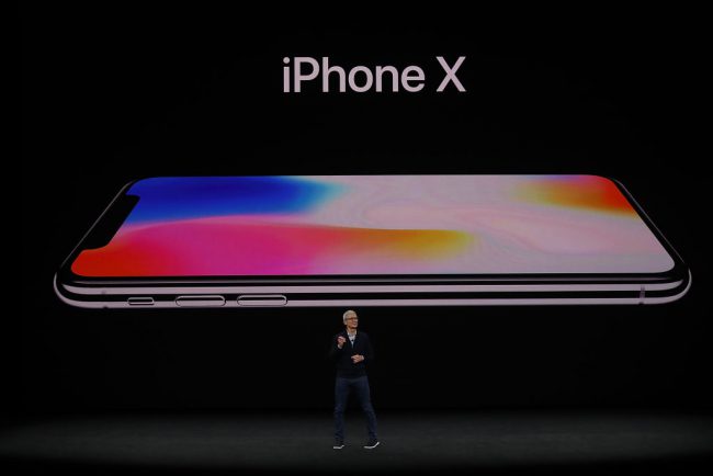 CUPERTINO, CA - SEPTEMBER 12:  Apple CEO Tim Cook announces the new iPhone X during an Apple special event at the Steve Jobs Theatre on the Apple Park campus on September 12, 2017 in Cupertino, California. Apple is holding their first special event at the new Apple Park campus where they are expected to unveil a new iPhone.  (Photo by Justin Sullivan/Getty Images).