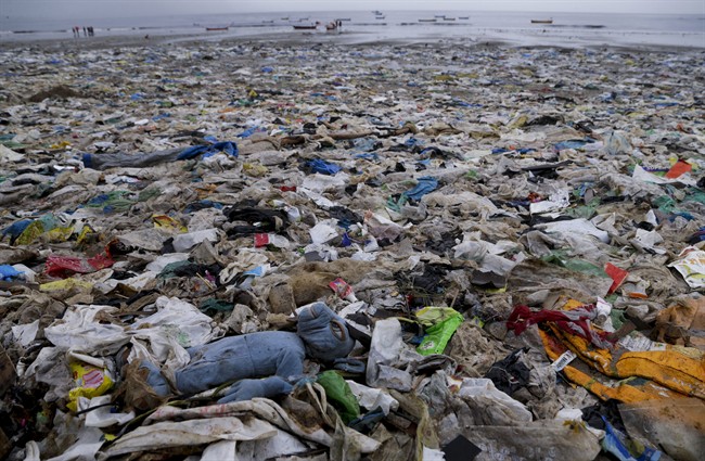 This Aug. 19, 2017 photo, shows garbage at the Versova beach on the Arabian Sea coast in Mumbai, India.