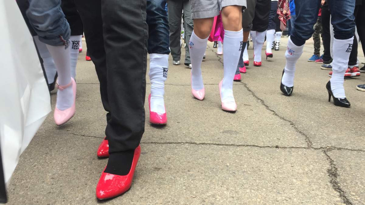Over 400 men took to 104 Street in downtown Edmonton for the 2017 Walk a Mile in Her Shoes event.