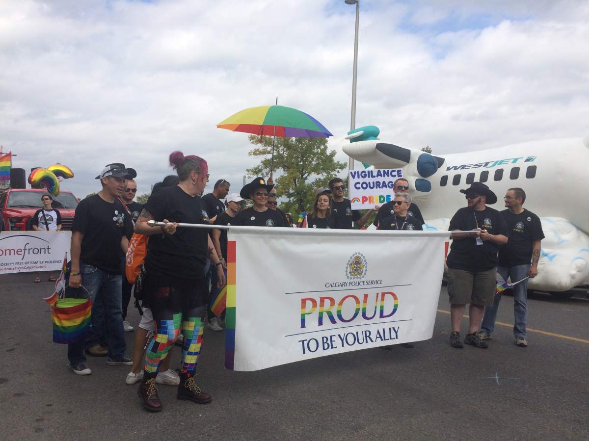 Calgary police participate in the 2017 Pride Parade for the first time not in uniform.