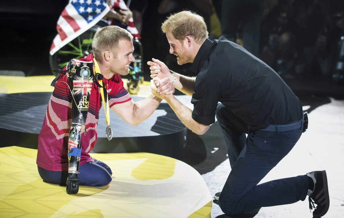 Prince Harry presents a medal to the United Kingdom’s Mark Ormrod after he won silver in the Men’s IR1 One Minute Sprint Final during the Indoor Rowing at the Mattamy Athletic Centre during the 2017 Invictus Games in Toronto, Canada.