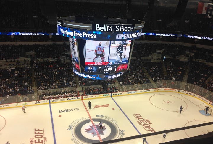 Winnipeg Jets and Calgary Flames players skate around at Bell MTS Place just prior to puck drop on Monday, September 25.