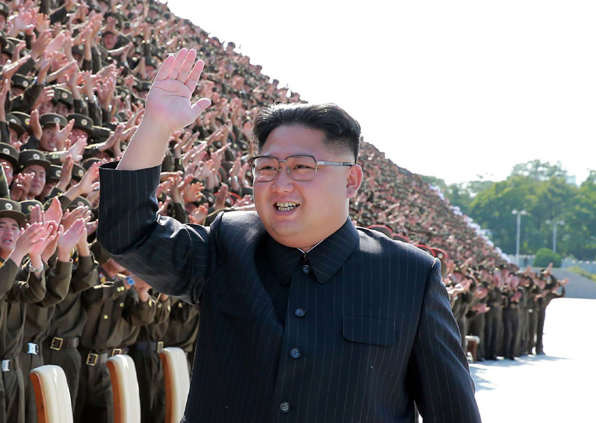 This undated picture released by North Korea's official Korean Central News Agency (KCNA) on September 2, 2017 shows North Korean leader Kim Jong-Un (C) attending a photo session with participants of the fourth conference of active secretaries of primary organisations of the youth league of the Korean People's Army (KPA) in Pyongyang.