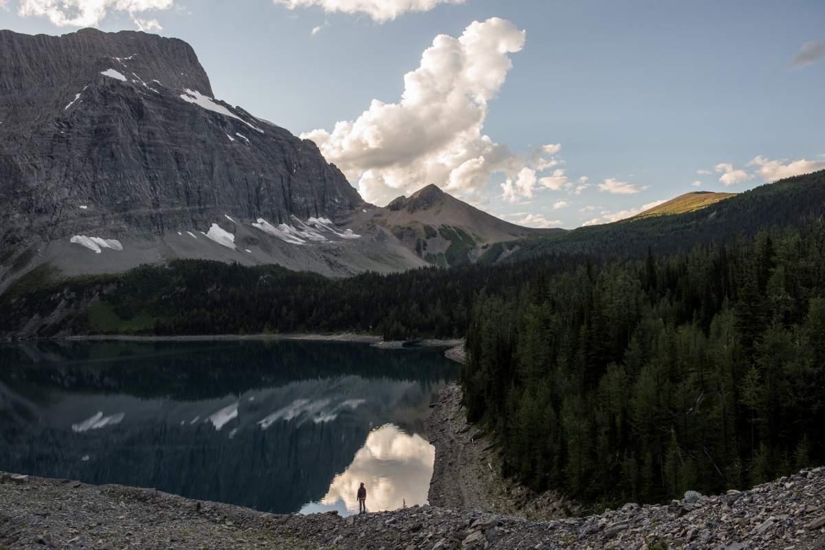 A hiker above Floe Lake in Kootenay National Park.