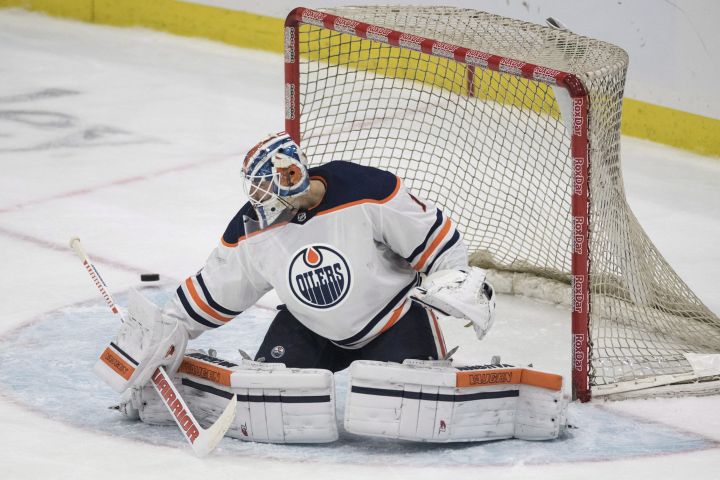 Edmonton Oilers goalie Laurent Brossoit lets a shot go wide from the Carolina Hurricanes during the first period of NHL pre-season action in Saskatoon, Sask. Wednesday, September 27, 2017. 