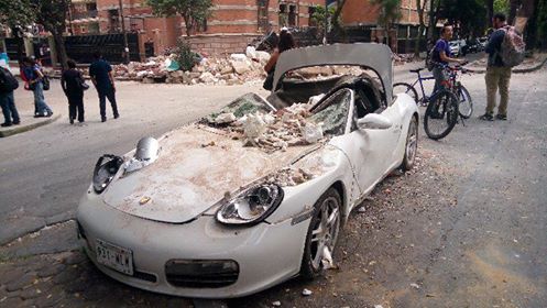 Rubble from buildings came crashing down on city streets