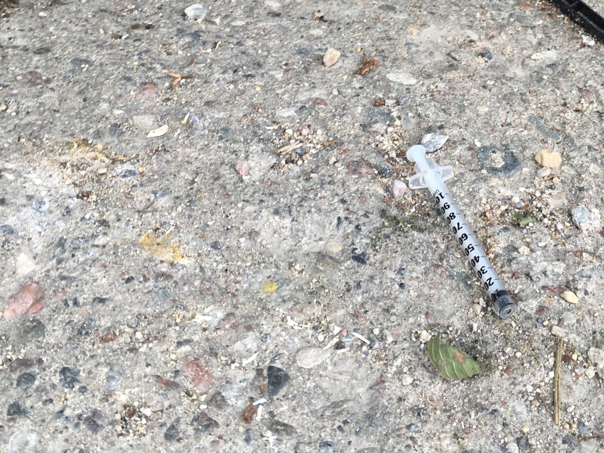A used needle on Winnipeg's River Avenue.