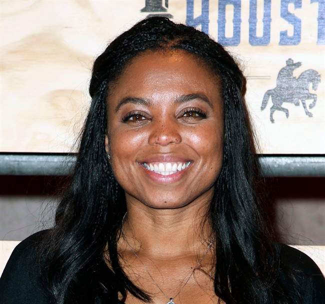 This is a Feb. 3, 2017, file photo showing Jemele Hill attending ESPN: The Party 2017 in Houston, Texas. ESPN distanced itself from anchor Jemele Hill’s tweets one day after she called President Donald Trump “a white supremacist” and “a bigot.”