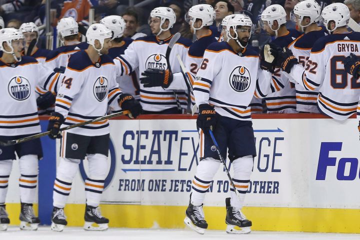 Edmonton Oilers' Jujhar Khaira (16) celebrates his goal against the Winnipeg Jets during second period NHL pre-season game action in Winnipeg on Wednesday, September 20, 2017. 