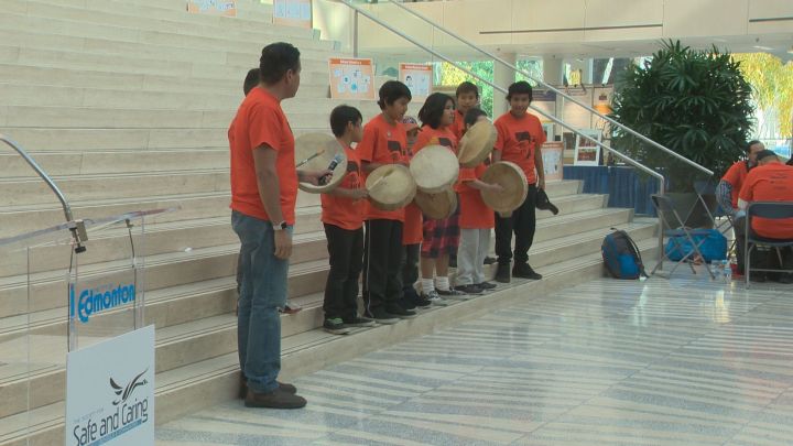 A day before similar events will be held across the country, hundreds of Edmontonians gathered at city hall on Friday for Orange Shirt Day.