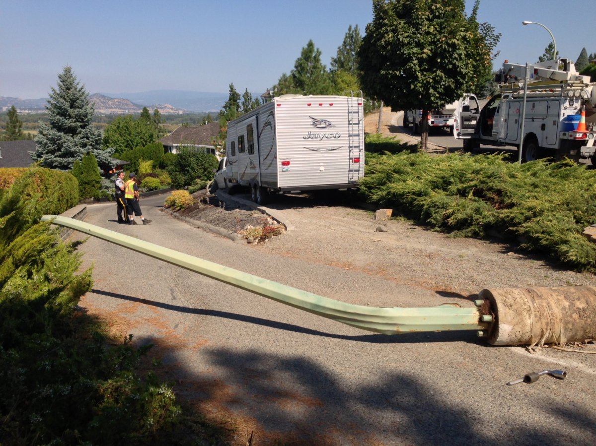 A passenger took control of a pickup truck after the driver fell unconscious in Kelowna.